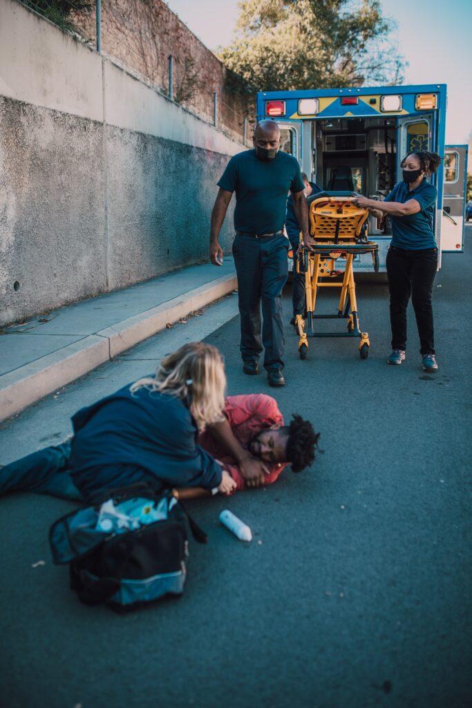 paramedics treating an injured man